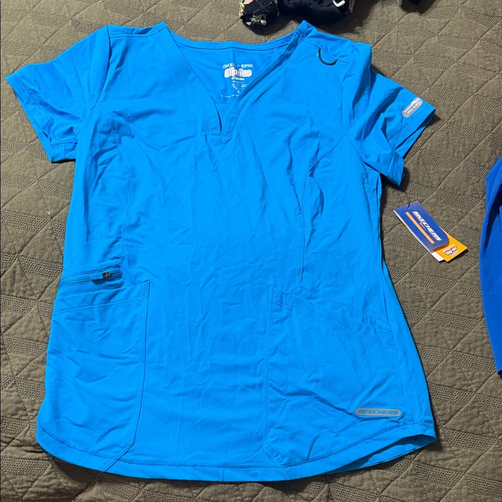 Blue Sketchers Scrub Women's Top